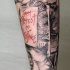 Illustrative style colored arm tattoo of creepy man with lettering