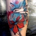 Illustrative style colored arm tattoo of flying bird with flower
