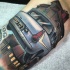 Illustrative style colored Harry Potter movie flying car tattoo on arm