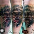 Illustrative style colored leg tattoo of tribal man