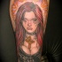 Illustrative style colored leg tattoo of seductive woman with cross