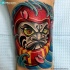 Illustrative style colored leg tattoo of daruma doll with wave