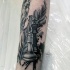 Illustrative style colored leg tattoo of chess figures and feather