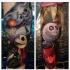 Illustrative style colored Nightmare before Christmas cartoon heroes tattoo on forearm