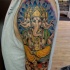Illustrative style colored shoulder tattoo of elephant like god