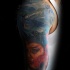 Illustrative style colored shoulder tattoo of WW2 plane with cild portrait