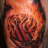 Illustrative style colored shoulder tattoo of burning AC Milan club emblem