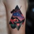 Illustrative style colored shoulder tattoo of triangle and symbol