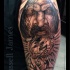 Illustrative style colored shoulder tattoo of mystical man with broken clock