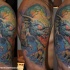 Illustrative style colored shoulder tattoo of fantasy monster dragon