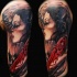 Illustrative style colored shoulder tattoo of woman with geisha picture