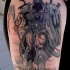 Illustrative style colored shoulder tattoo of fantasy shadow warrior
