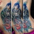 Illustrative style colored side tattoo of cartoon monsters