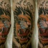 Illustrative style colored tattoo of roaring tiger with lettering