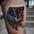 Illustrative style colored thigh tattoo of night monster with sun and lightning