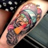 Illustrative style colored thigh tattoo of astronaut with ice-cream