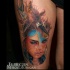 Illustrative style colored thigh tattoo of beautiful woman with feather helmet