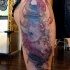 Illustrative style colored thigh tattoo of saint bull with snake