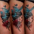 Illustrative style colored thigh tattoo of woman with butterflies and flowers