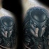 Illustrative style very detailed scapular tattoo of Predator