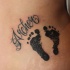 impronti di bambino con nome tatuaggio