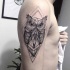 Tatuaje en el antebrazo,
lechuza hermosa magnífica