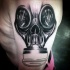 Incredible skull shaped shoulder tattoo of modern gas mask