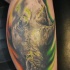 Tatuaje de rinoceronte de color en la pierna