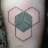Tatuaje en la pierna, formas geométricas interesantes