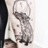 interessante stile dipinto nero e bianco geometrico volpe con pianeta tatuaggio su braccio