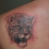 Tatuaje en el hombro, cara de jaguar bonito