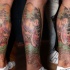 Japanese traditional colored leg tattoo of geisha woman