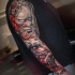 Japenese graphic full sleeve tattoo