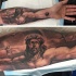 Jesus Christus leidet auf Kruzifix Unterarm religiöses Tattoo
