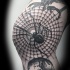 Large black ink arm tattoo of of incredible spider web and big spider