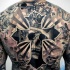 Large black ink back tattoo of human cross and king skeleton