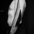 Large blackwork style sleeve tattoo of big lines
