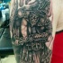 Large detailed black and white shoulder tattoo of antic gladiator warrior