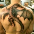 Large fantasy dragon tattoo on back