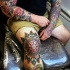 Large multicolored knee tattoo of beautiful flower