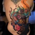 Large new school style colored whole back tattoo of fantasy owl with tree and flowers