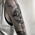 Tatuaggio ampio braccio superiore separato da Inez Janiak tatuaggio braccio superiore di teste di leone e panda