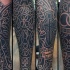 Large spectacular looking black ink leg tattoo of lettering and cross