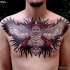 Large very beautiful colored chest tattoo of big mystical owl with diamond