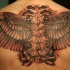 Large wings tattoo on back