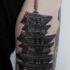 Lifelike black and wite detailed Asian temple tattoo on upper arm