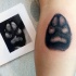 Lifelike very detailed tattoo of small dog paw