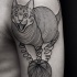 Linework style black ink shoulder tattoo of evil cat