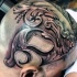 Little black and white number tattoo on head