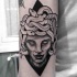 Tatuaje en el antebrazo,
Medusa Gorgona horrorosa